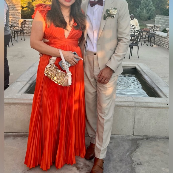 Mac Duggal Pleated Flutter Sleeve Deep V lace Up gown. - Picture 4 of 5